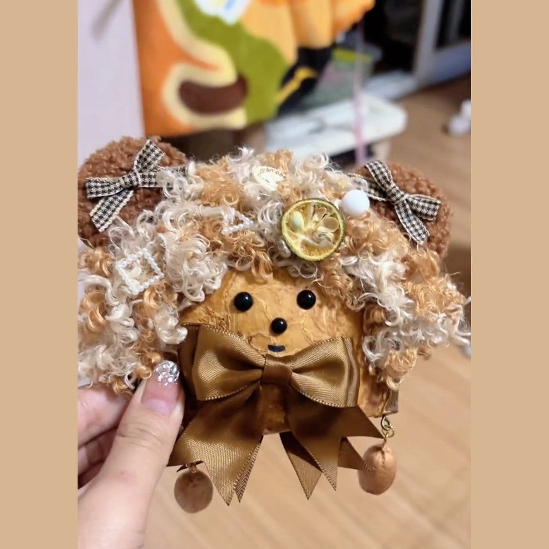 Pod Baby – Pudelwelpe mit Fliege
